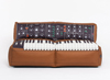 アナログ・シンセサイザーの代表機種「Minimoog」がソファーに