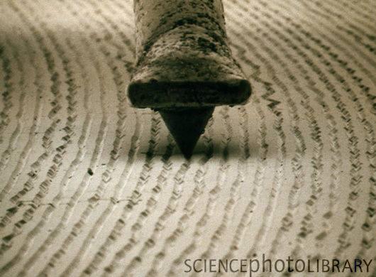 Microscopic photo of vinyl record grooves
