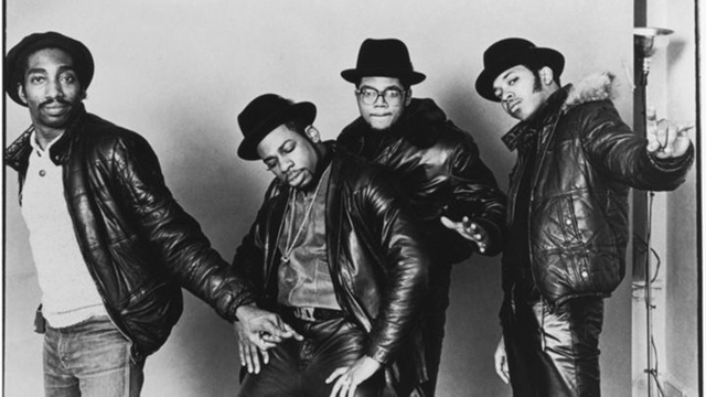 Larry Smith (left) with Run-D.M.C.