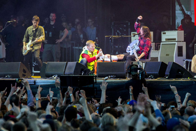 Dave Grohl Performing With Broken Leg