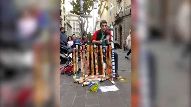 Street drummer wows spectators with plastic pipe jam to Depeche Mode