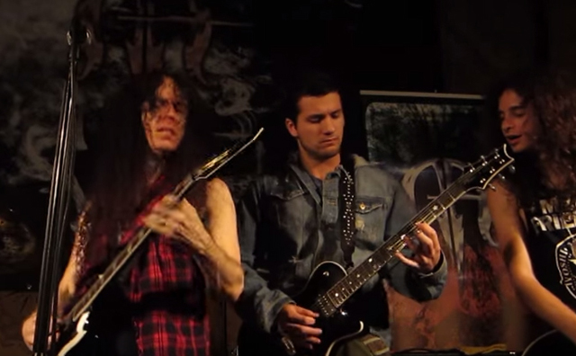 Marty Friedman and audience member guitarist