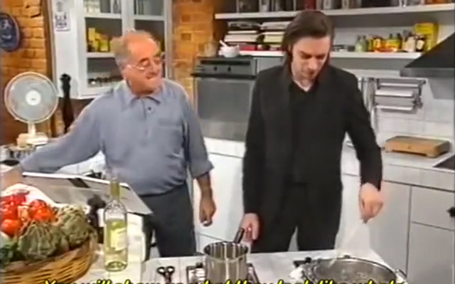 Einsturzende Neubauten's Blixa Bargeld cooking squid ink risotto on German TV.