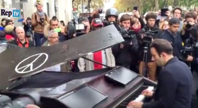 Pianist Cover John Lennon’s ‘Imagine’ Outside Targeted Paris Concert Venue