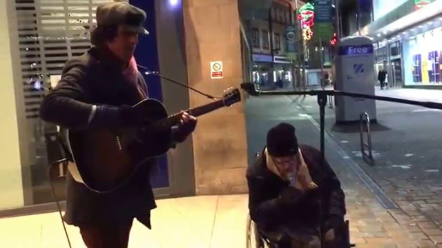Old Homeless Man Joins Busker For Impromptu New Year’s Eve Street Jam