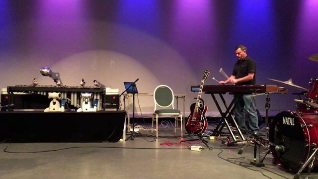 Shimon the robot jamming with a human marimba player at Moogfest