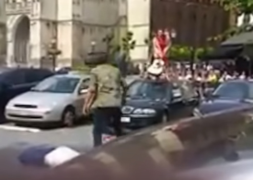 Furious woman smashes boyfriends car with guitar and destroys windscreen