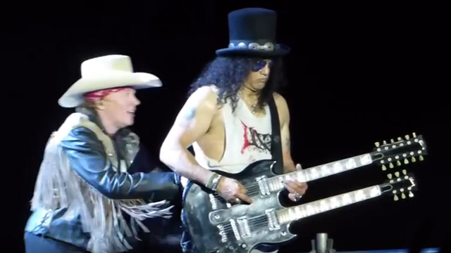 Axl Tickles Slash
