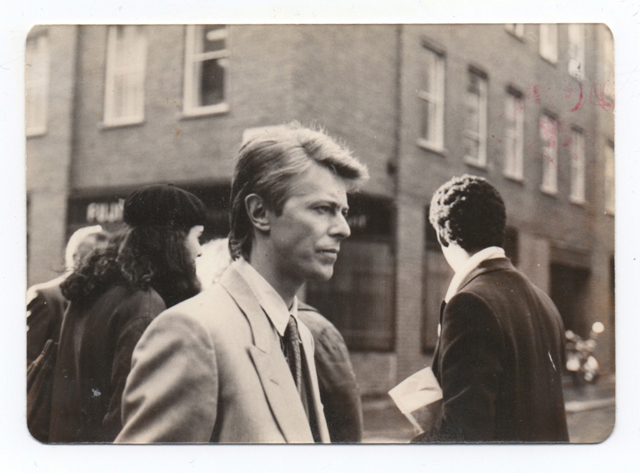 David Bowie walking around Soho, London in 1983