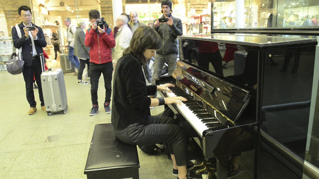 vkgoeswild playing Elton John's piano at St. Pancras Station - London