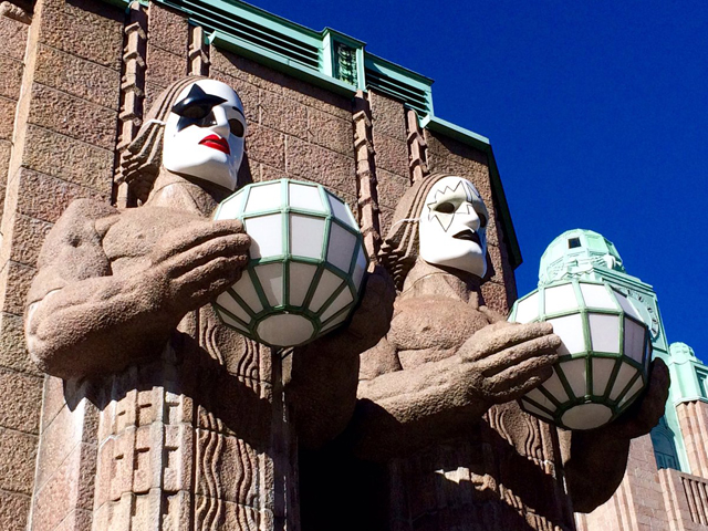 Helsinki Railway Station with KISS masks