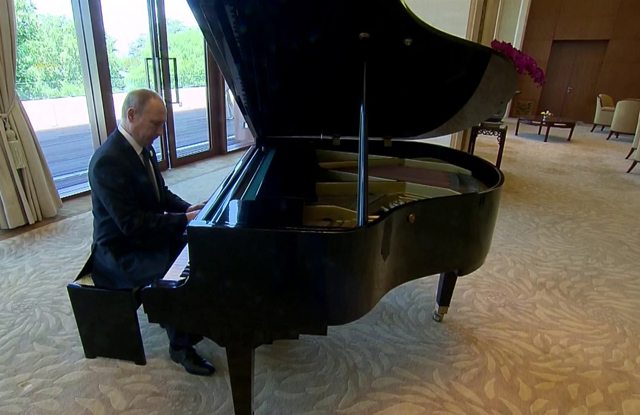 Putin Plays The Piano