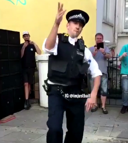 policeman dancing at NH Carnival