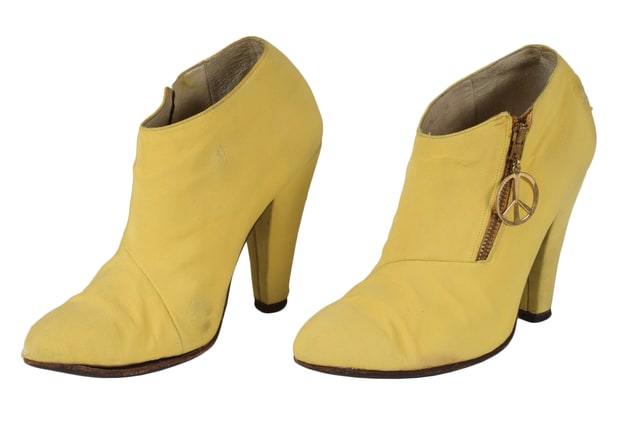 Prince’s yellow high-heeled boots from the Sign o' the Times tour. RR Auction
