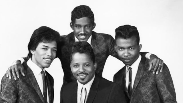 Jimi Hendrix (left) poses with Curtis Knight and the Squires.