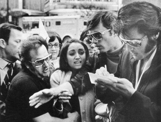 Elvis Presley Signing an Autograph for a 12-Year Old Madonna ? in 1970