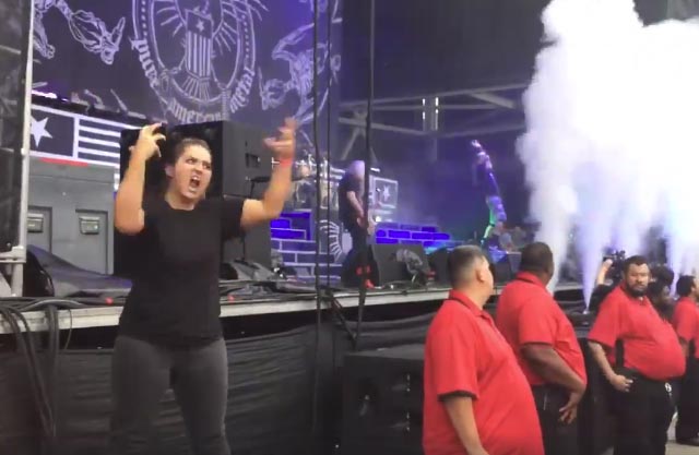 Woman Doing Sign Language For Lamb Of God's Live