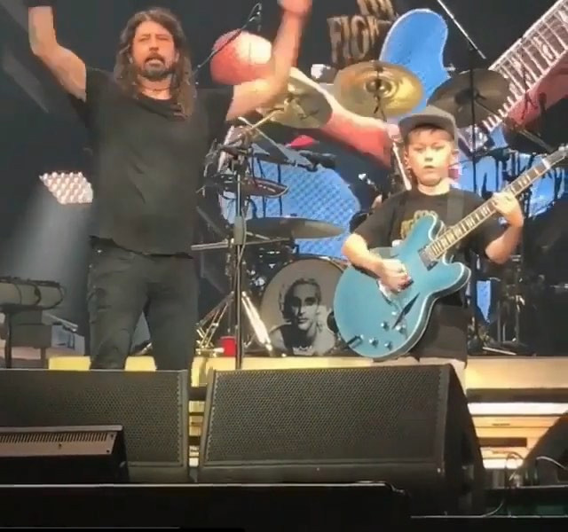 Young boy plays Metallica on stage at Foo Fighters show