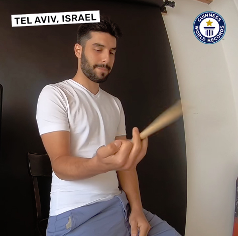 Eden Bahar - Most drumstick spins in one minute (one hand)