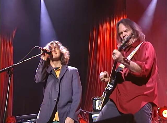 Neil Young and Eddie Vedder perform 