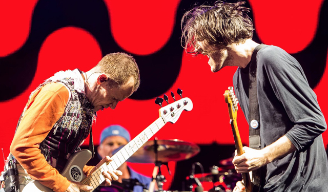 Flea and Josh Klinghoffer, photo by Philip Cosores