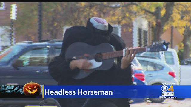 Meet The Concord Bicyclist Behind The Headless Horseman Playing Guitar