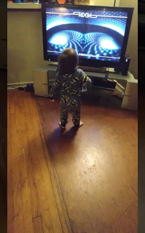 baby rocking out to TOOL