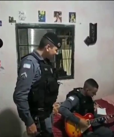 Cop playing Metallica &Iron Maiden on guitar