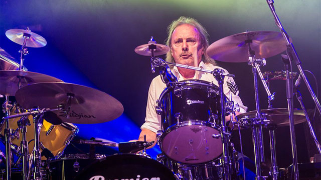 John Coghlan on stage with Status Quo in 2014