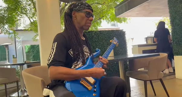 Nile Rodgers playing prince's guitar