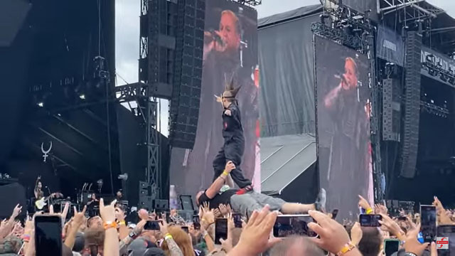 Kid surfing on his crowdsurfing dad during the Ded set at LTL 2022!