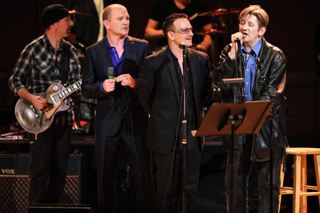 The Edge, Gavin Friday, Bono and Shane MacGowan perform at Carnegie Hall in 2009.