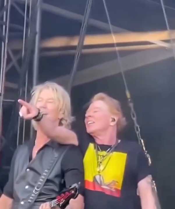Estranged Dolphins return Axl's lost shoe from music video