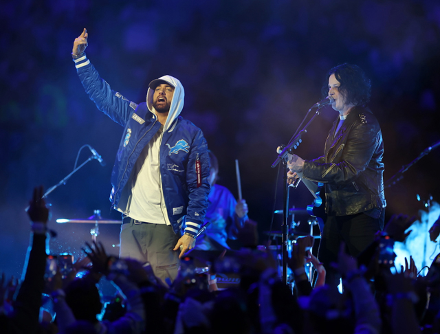 Jack White with Eminem During at Detroit Lions and Green Bay Packers game halftime set Gregory Shamus/Getty Images