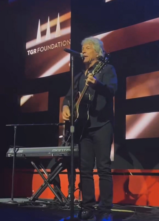 Jon Bon Jovi performing 'Livin' on a Prayer' at Tiger Woods' 50th birthday party
