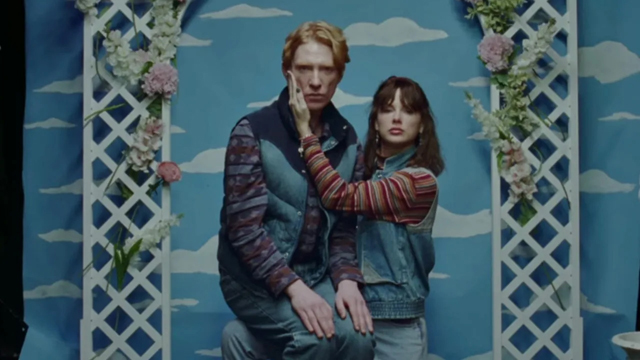 Taylor Swift and Domhnall Gleeson in “Opalite” video