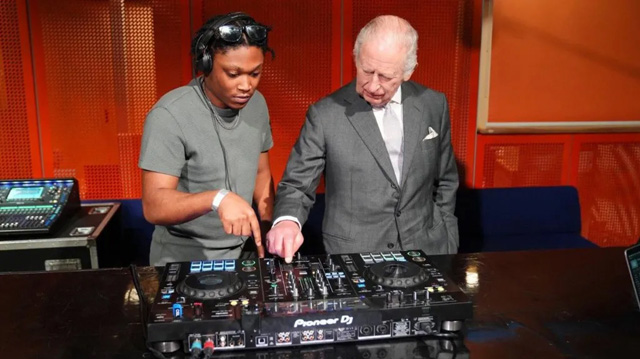 King Charles III and DJ Christian St Louis - PA Media